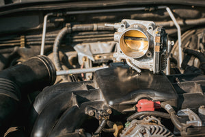 What is a car’s throttle body and what does it do?